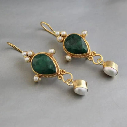 Aretes vintage con rubíes y margaritas
