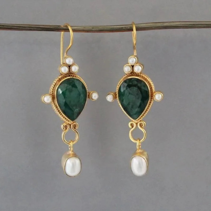 Aretes vintage con rubíes y margaritas