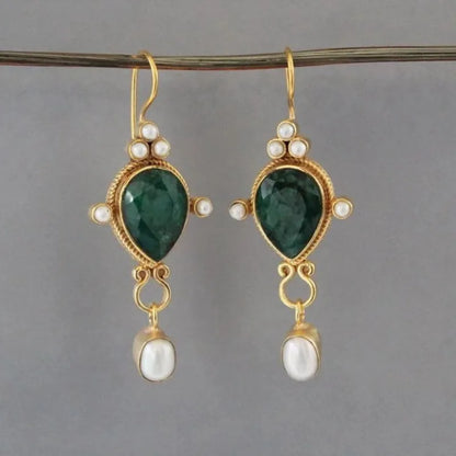 Aretes vintage con rubíes y margaritas