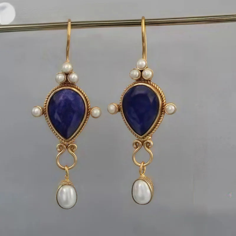 Aretes vintage con rubíes y margaritas