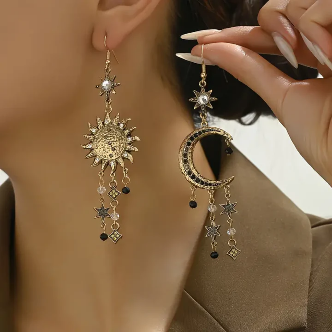 Aretes vintage con sol y luna colgantes