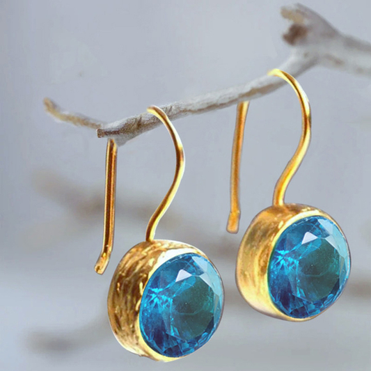 Aretes vintage de oro con cristales azules