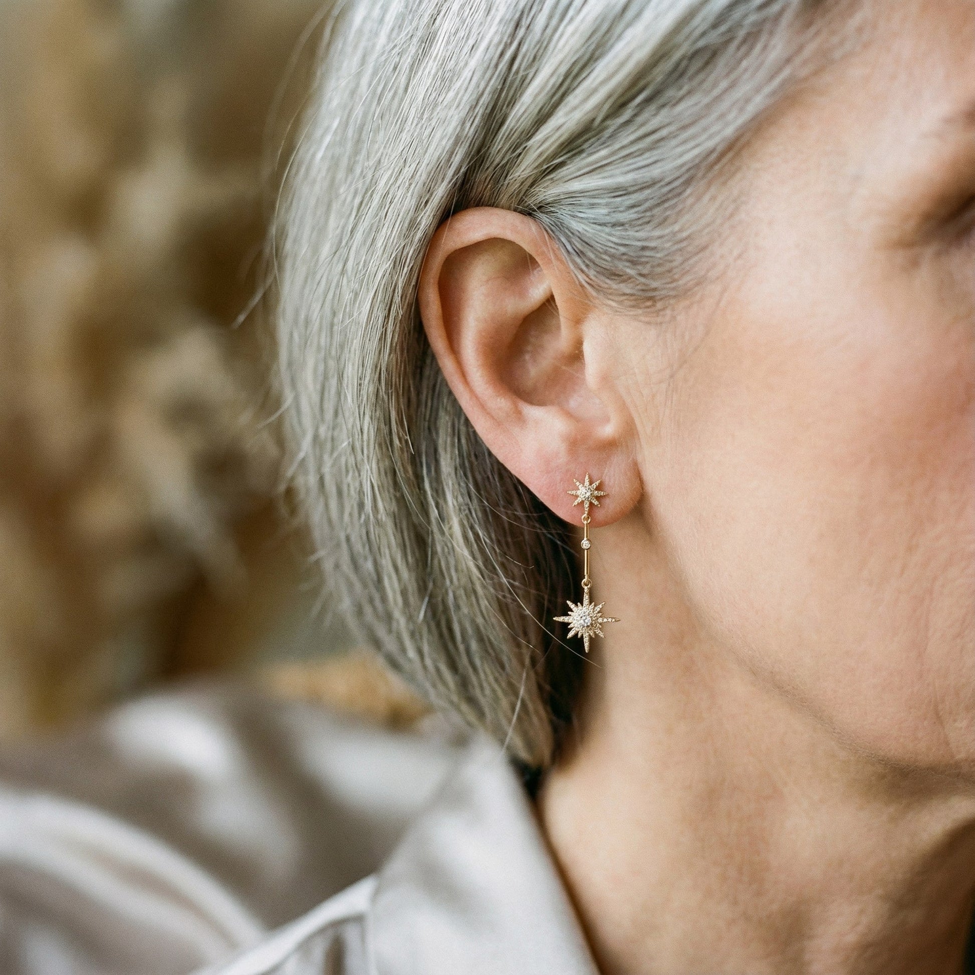 Aretes vintage de oro con estrella de cristal