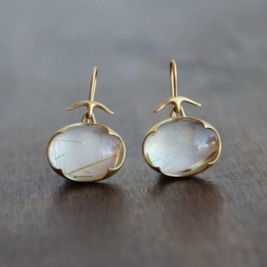 Aretes vintage de oro con piedra de luna