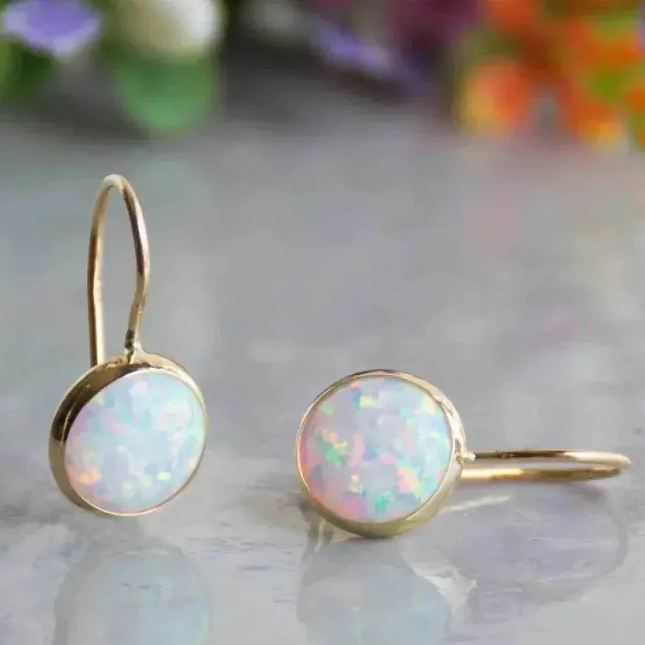 Aretes vintage de oro con piedra ópalo