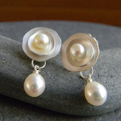 Aretes vintage de plata con margaritas