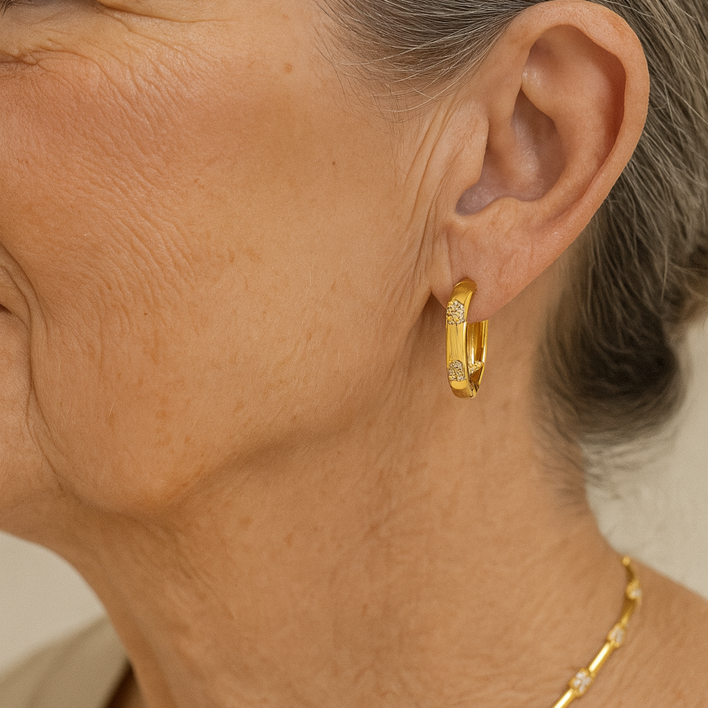 Aretes vintage de rueda con flor de oro