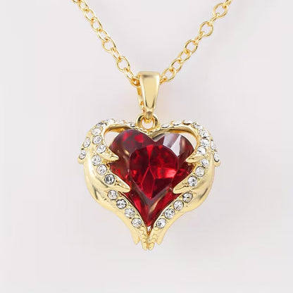 Collar con corazón de rubí ángel | Oro