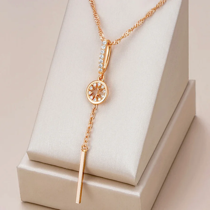 Collar elegante con cristal redondo en oro