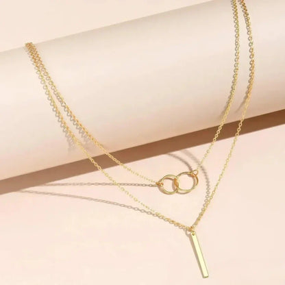 Collar retro en oro con colgante redondo doble