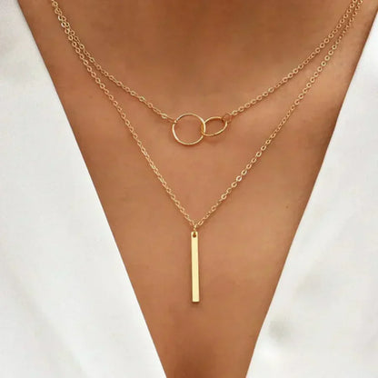 Collar retro en oro con colgante redondo doble