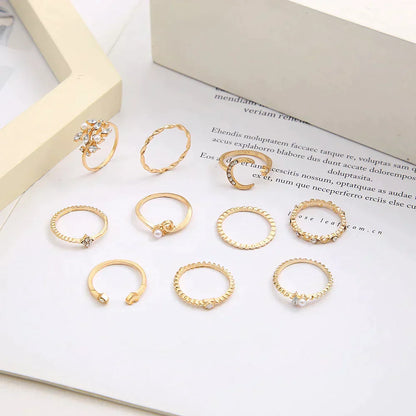 Conjunto de 10 anillos de asistencia decorados con plata y oro