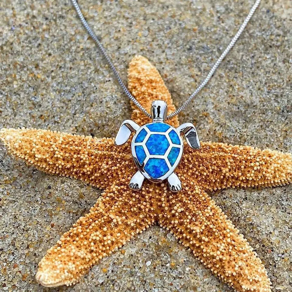 Conjunto de collar y aretes con tortuga marina de ópalo y plata