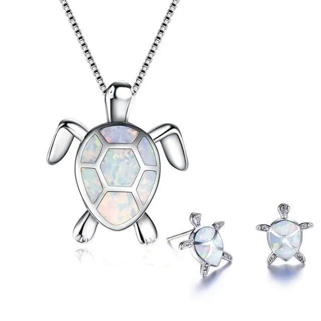 Conjunto de collar y aretes con tortuga marina de ópalo y plata
