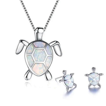 Conjunto de collar y aretes con tortuga marina de ópalo y plata