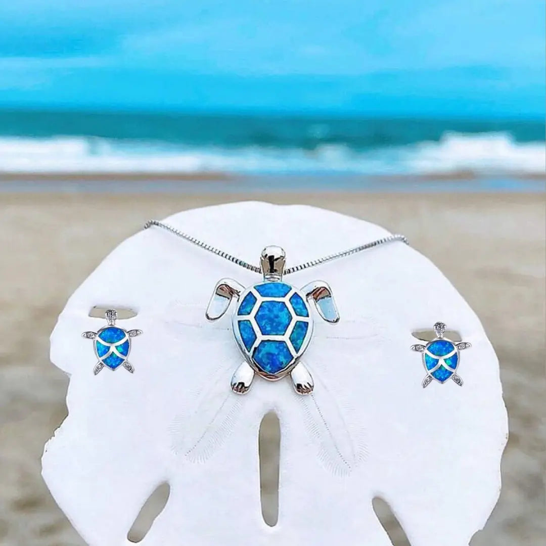 Conjunto de collar y aretes con tortuga marina de ópalo y plata