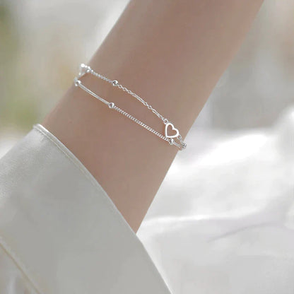 Pulsera ajustable con corazón de plata