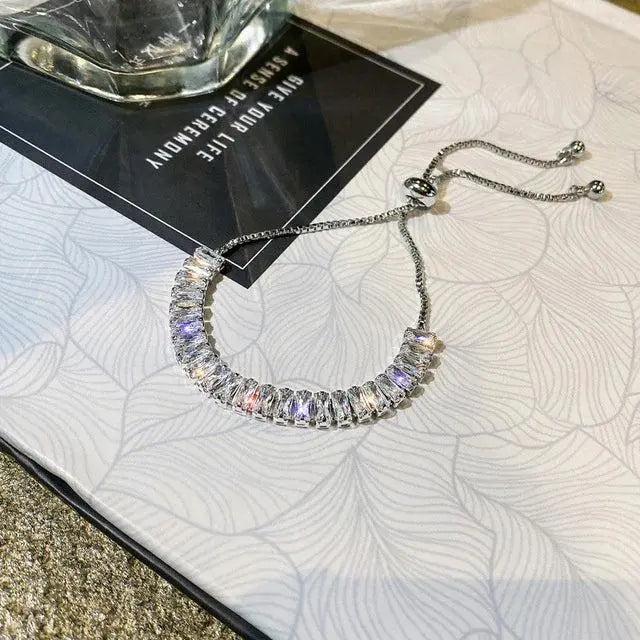 Pulsera ajustable de zirconia en oro y plata