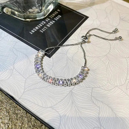 Pulsera ajustable de zirconia en oro y plata