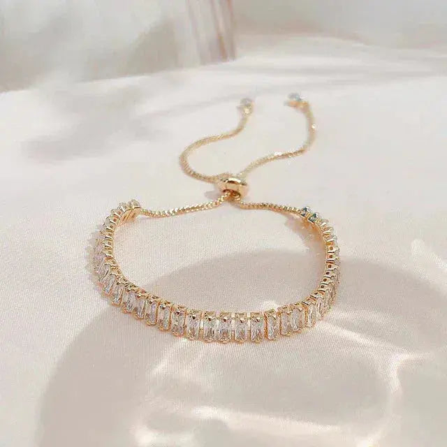 Pulsera ajustable de zirconia en oro y plata