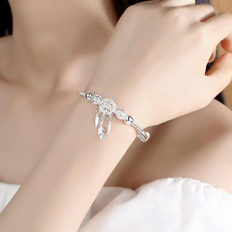 Pulsera atrapa-sueños ajustable de plata