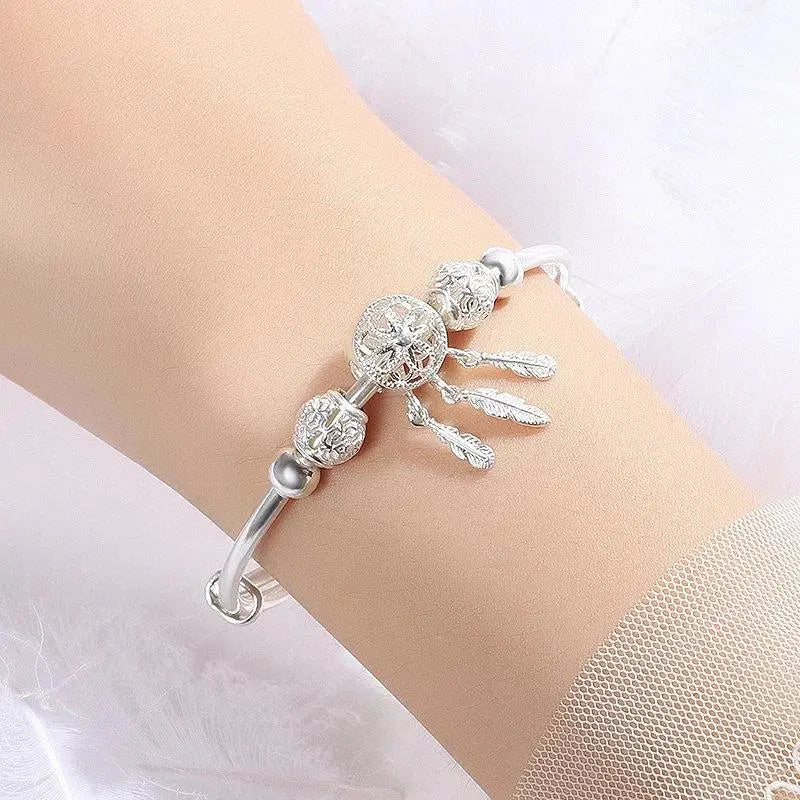 Pulsera atrapa-sueños ajustable de plata