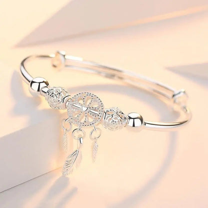 Pulsera atrapa-sueños ajustable de plata
