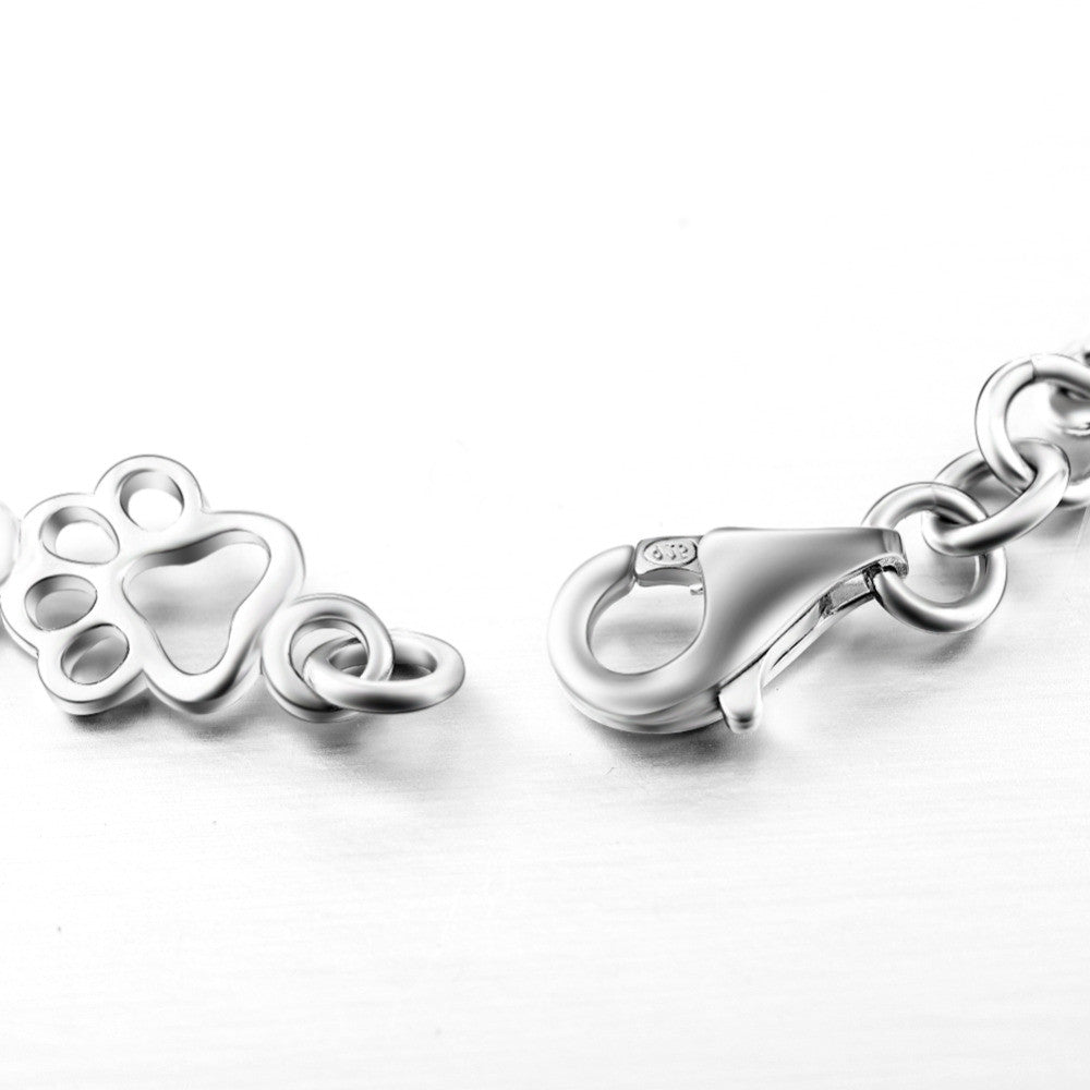 Pulsera con Patas de Perro Suspendidas y Hueso de Plata Bruta, Edición Limitada