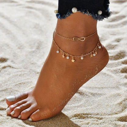 Pulsera con cordón infinito + perlas y estrellas