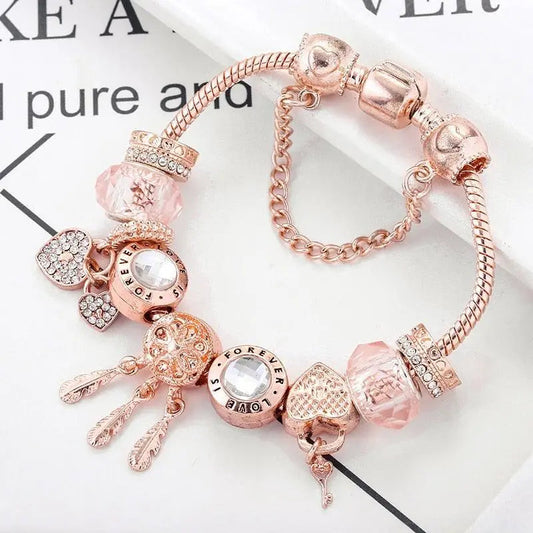 Pulsera de atrapasueños rosa con colgantes de plata