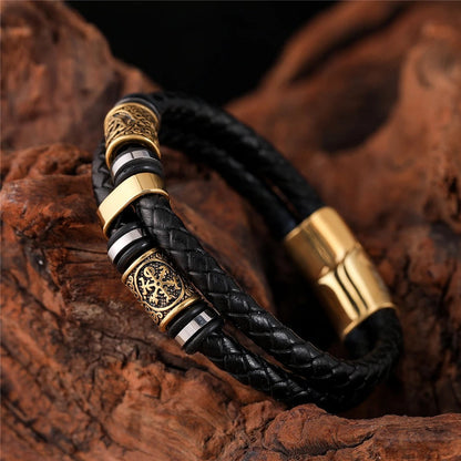 Pulsera de cuero negro trenzado con colgante de oro