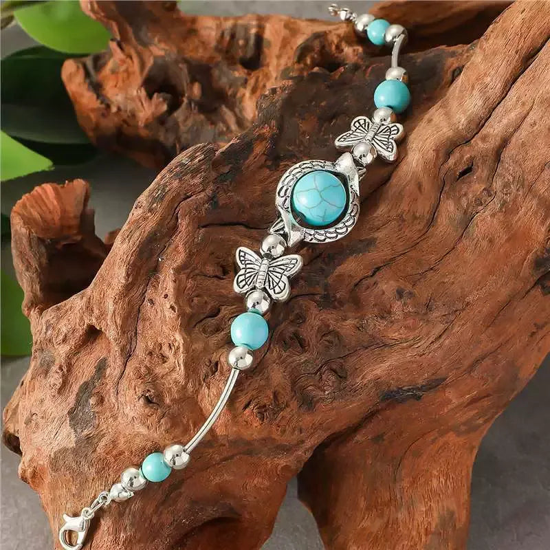 Pulsera de oro blanco con mariposas