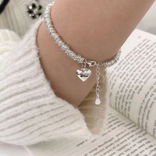 Pulsera elegante con corazón de plata