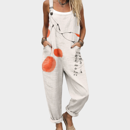 Rebeca | Overol blanco con flores en coral