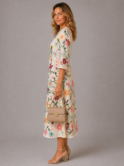 Dalia Vestido midi con flores bordadas