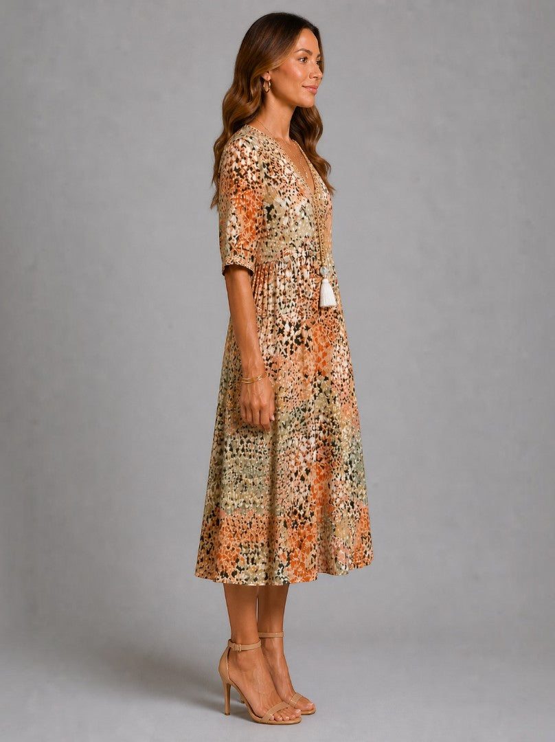 Adriana Vestido midi con estampado floral en ocre