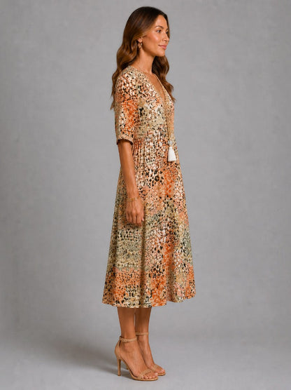 Adriana Vestido midi con estampado floral en ocre