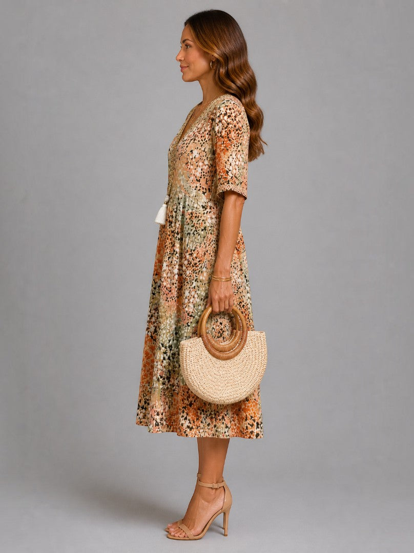 Adriana Vestido midi con estampado floral en ocre
